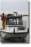 Ed piloting Frontier with first mate Robin Stewart